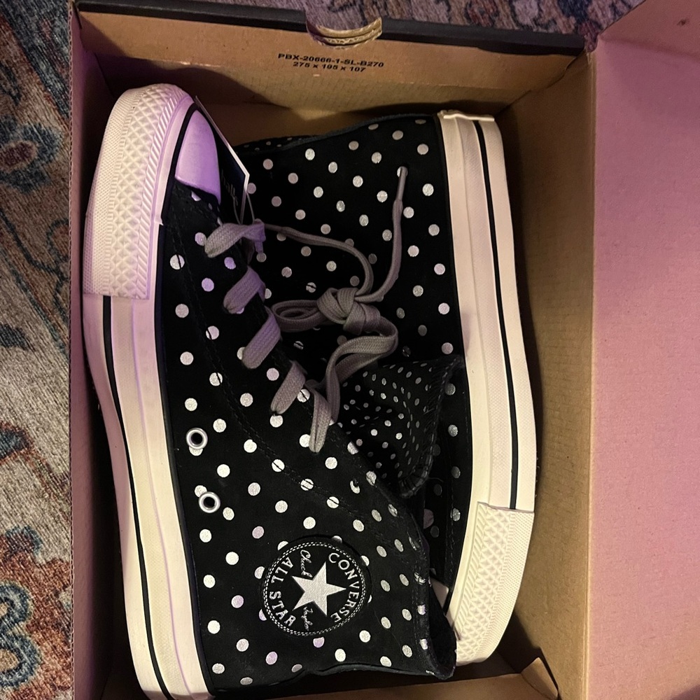 Brand new never worn women’s size seven converse all star high tops!